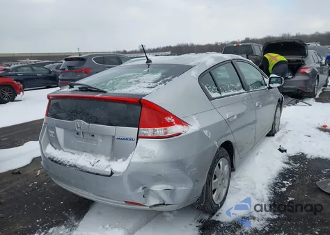2010 Honda Insight Lx z USA, uszkodzony, nr VIN JHMZE2H57AS002126